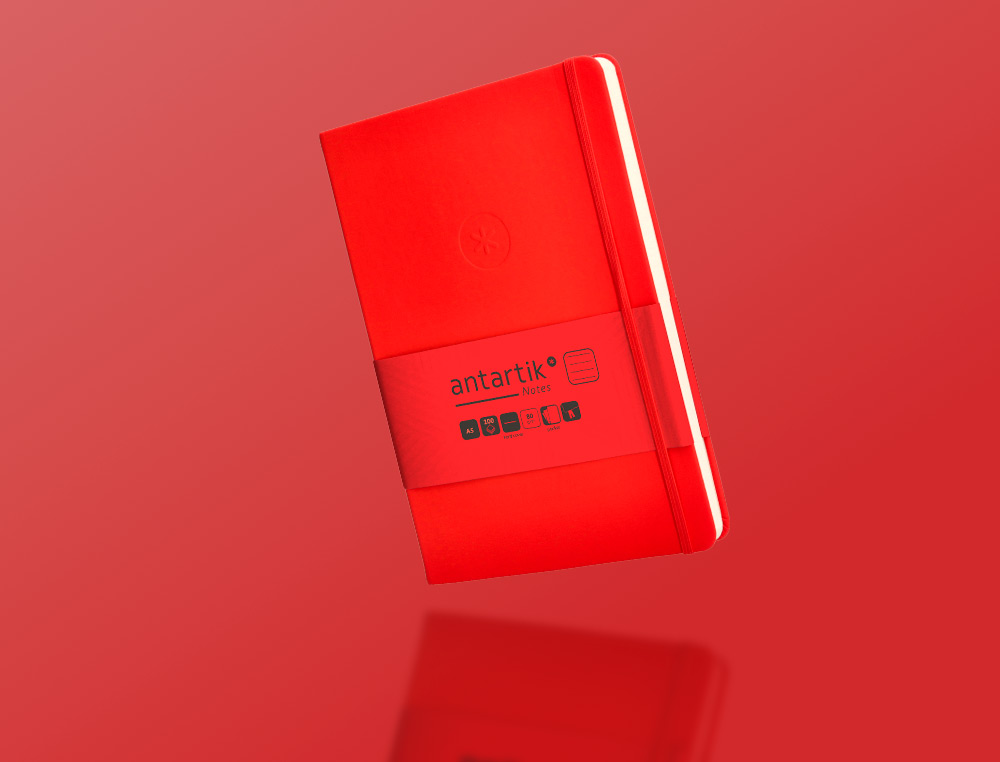 CUADERNO CON GOMILLA ANTARTIK NOTES TAPA DURA A5 HOJAS RAYAS ROJO 100 HOJAS 80 GR FSC